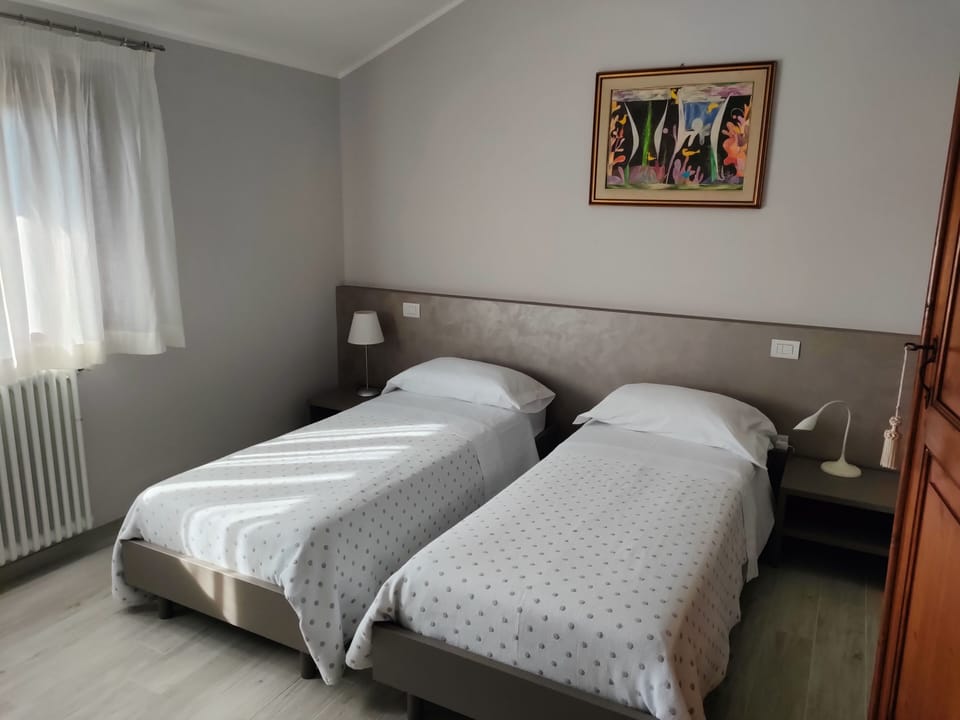 Apartment, 2 Bedrooms, Garden View | Premium bedding, individually furnished, desk, blackout drapes