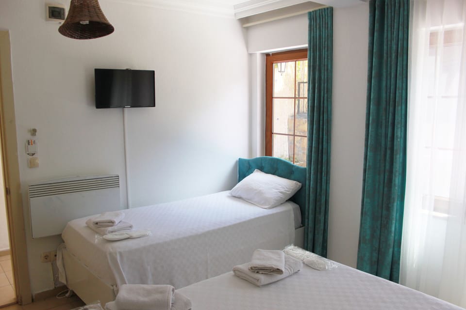 Desk, laptop workspace, free WiFi, bed sheets