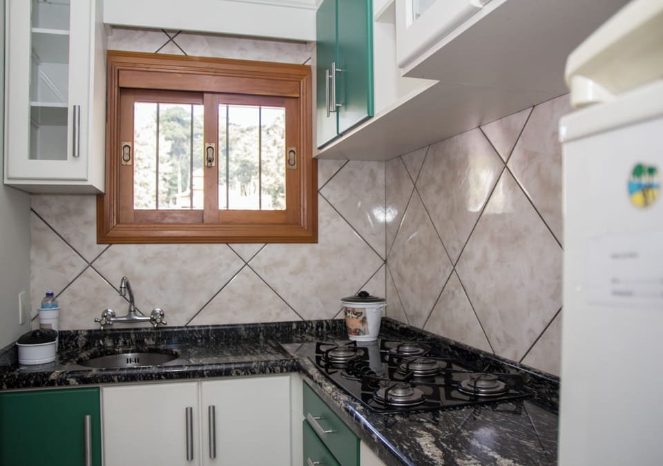 Family Apartment, Multiple Beds, Non Smoking, Garden View | Private kitchen | Microwave, cookware/dishes/utensils