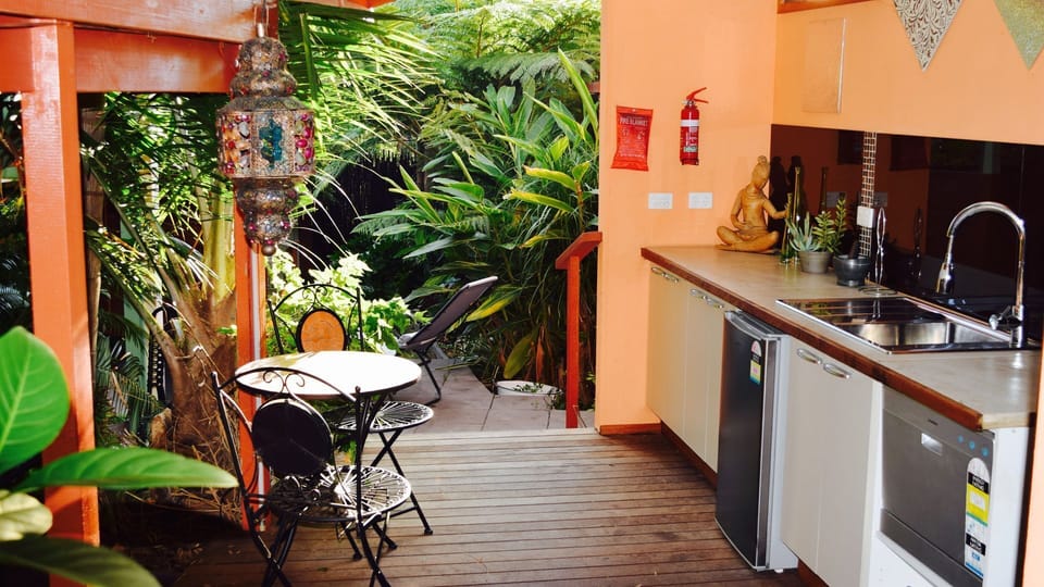 An additional outdoor kitchen and bbq area