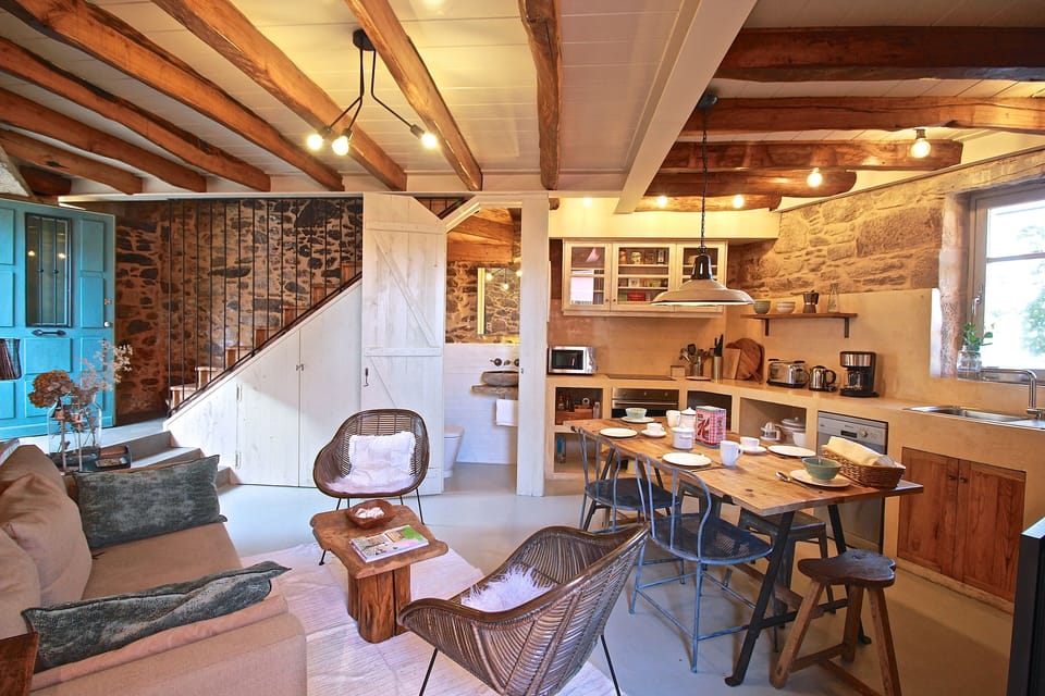 Cozy living room and kitchen with sea view and fireplace
