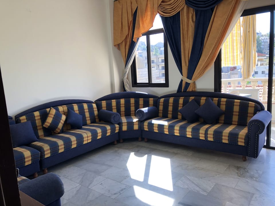 Apartment, 3 Bedrooms | Living room | Fireplace