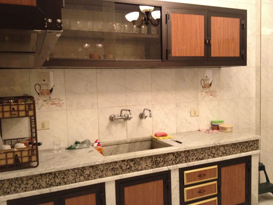 Apartment, 3 Bedrooms | Private kitchen | Coffee/tea maker, full-size fridge, oven, stovetop