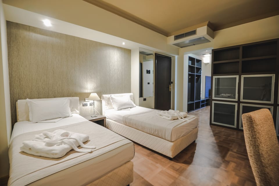 Family Room, Sea View | Hypo-allergenic bedding, minibar, in-room safe, desk