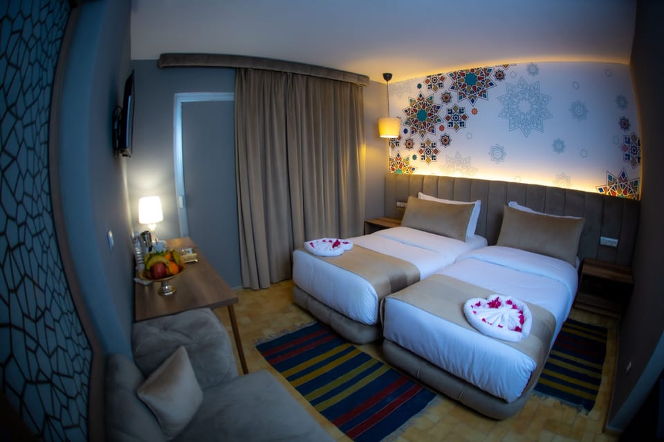 Triple Room | Minibar, in-room safe, laptop workspace, soundproofing