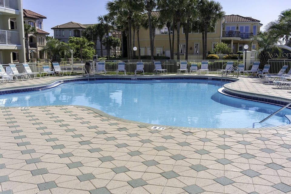 (1) of (2) Resort Swimming Pools ~ Enjoy some relaxation in the Chaise Loungers