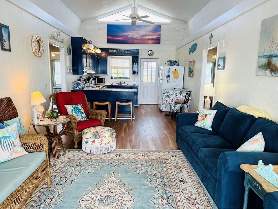 Living Room through to Kitchen and Front Door View