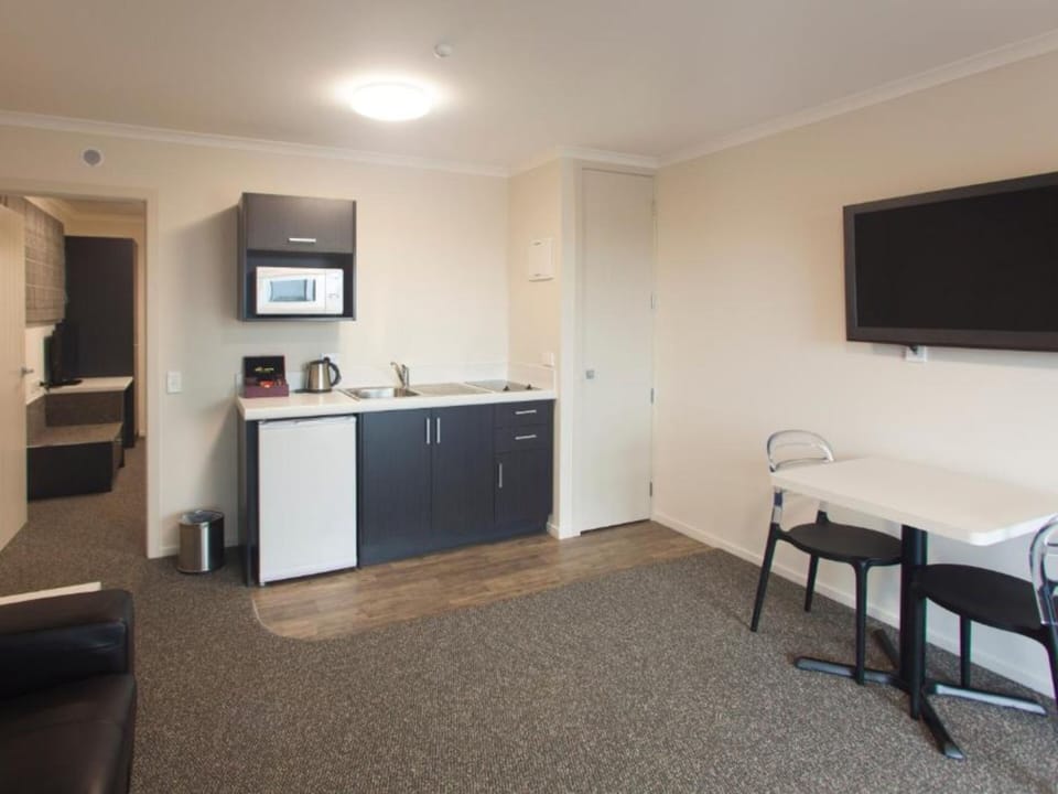 One Bedroom Suite | Private kitchen | Microwave, stovetop, coffee/tea maker, electric kettle