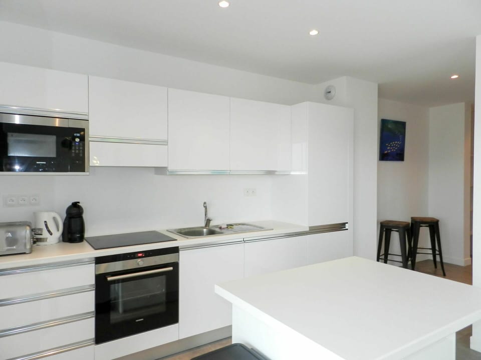 Cabinetry, Countertop, Property, Furniture, White, Kitchen Appliance, Kitchen Stove, Building, Cooktop, Gas Stove