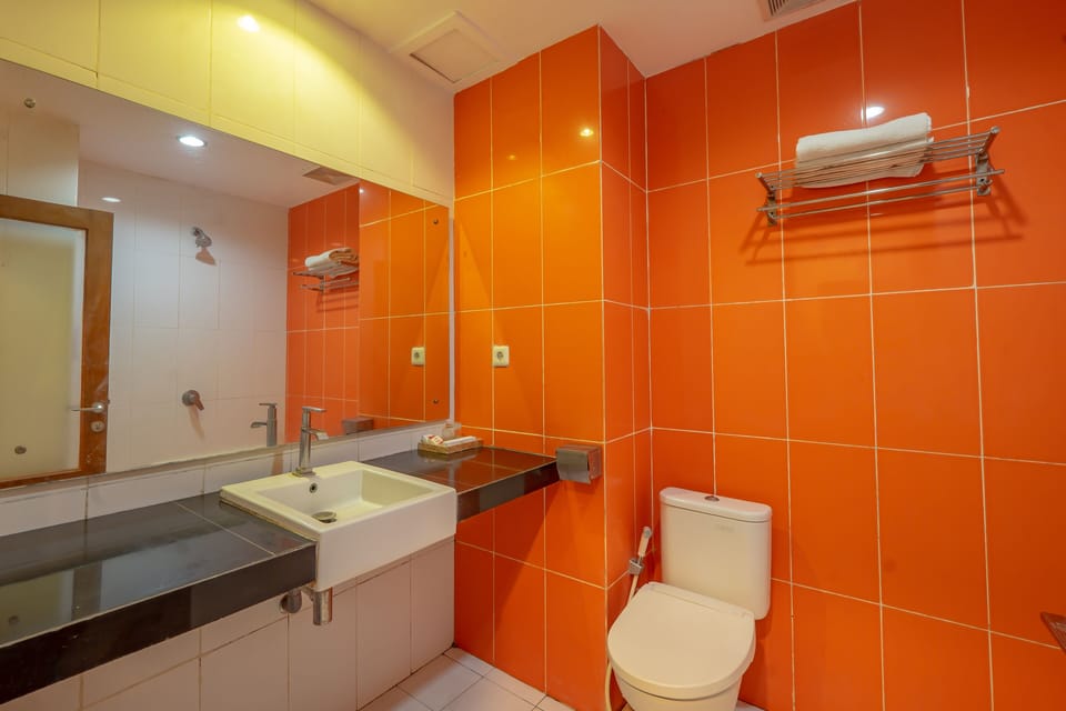 Shower, free toiletries, slippers, towels