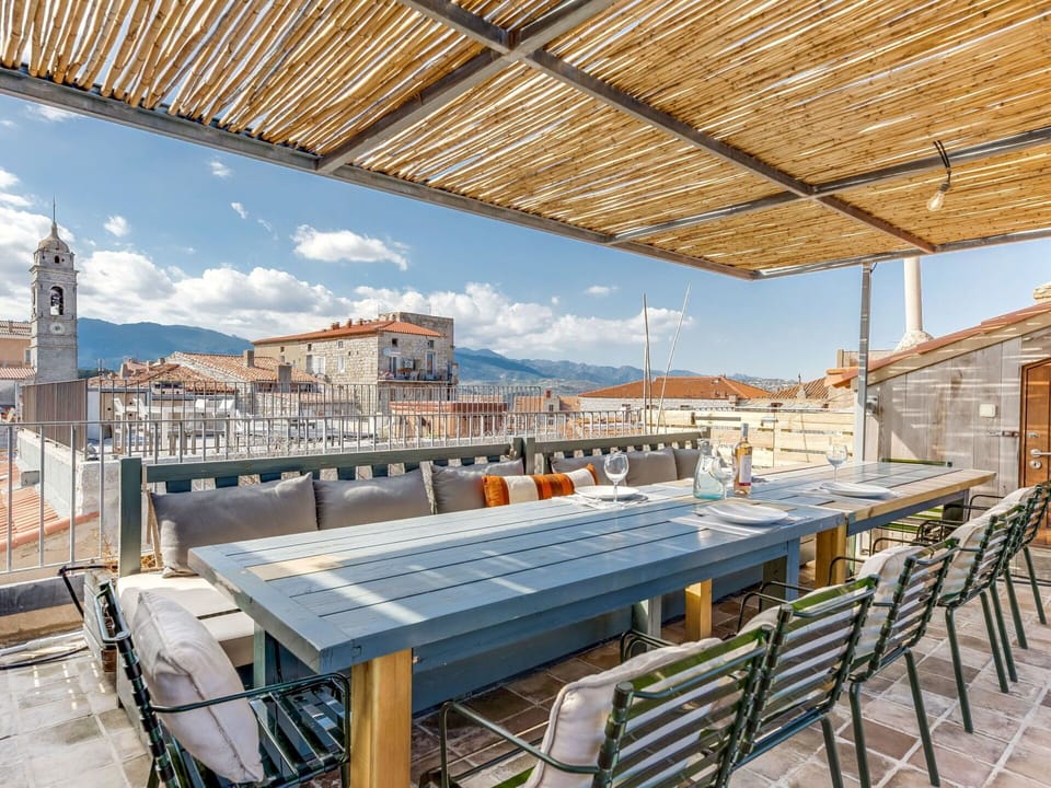 Sky, Cloud, Daytime, Building, Property, Window, Table, Shade, Wood, Chair