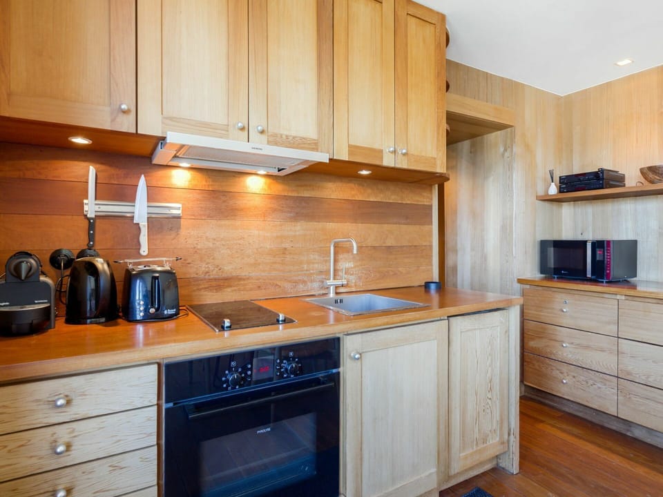 Cabinetry, Countertop, Building, Property, Furniture, Kitchen, Kitchen Stove, Wood, Kitchen Appliance, Drawer