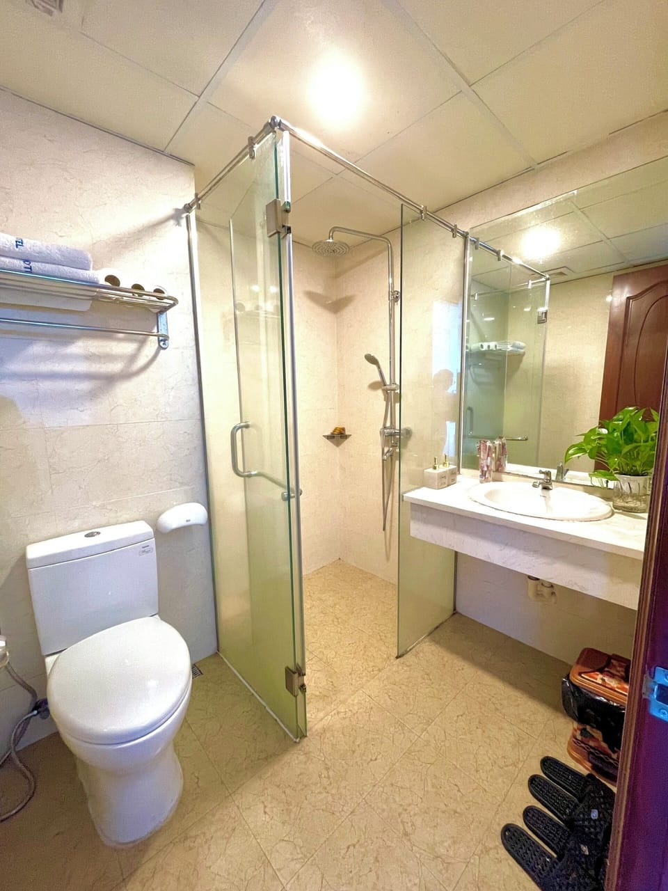 Shower, free toiletries, hair dryer, slippers
