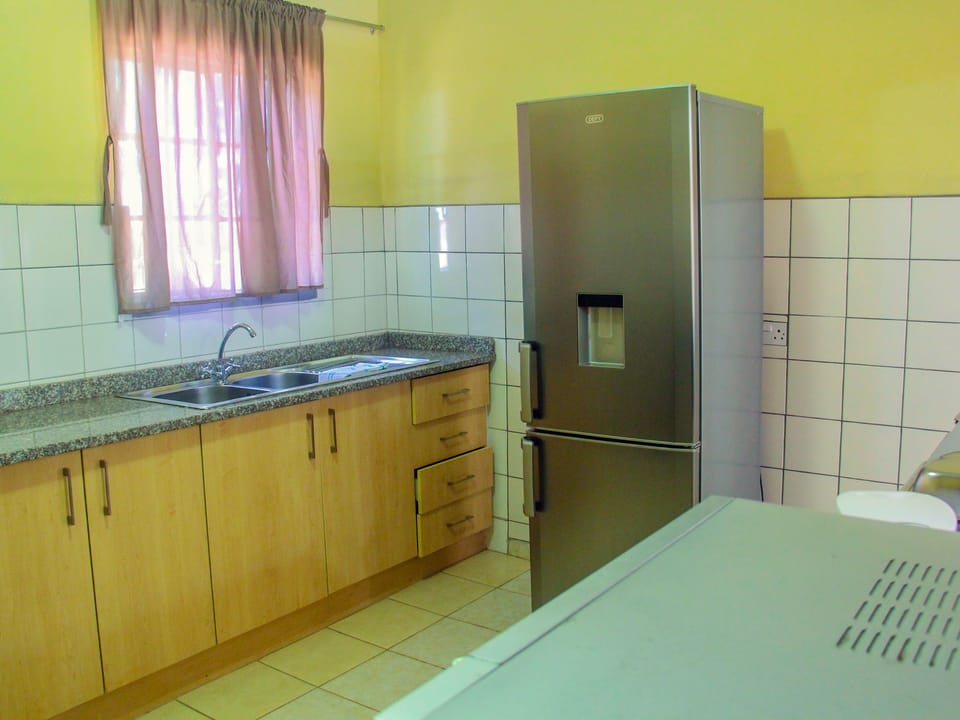 Fridge, microwave, cookware/dishes/utensils