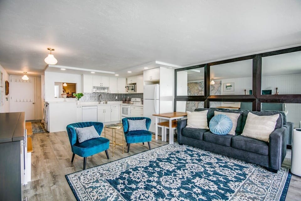 Living room and kitchen.  Queen size sofa bed.