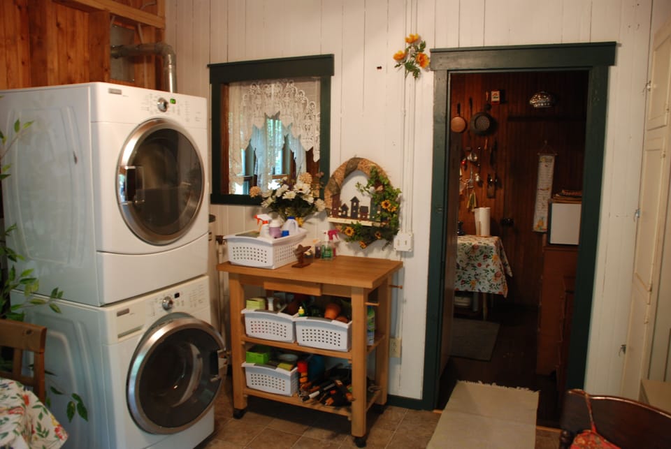 Modern, full-size washer and dryer on 1st floor