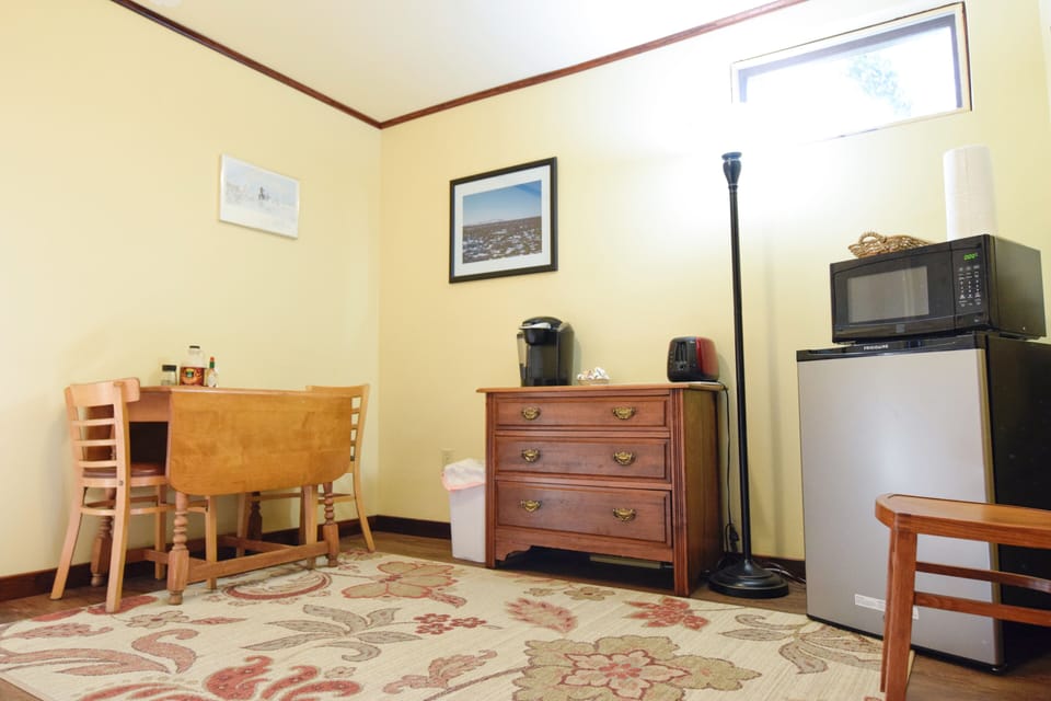 Shared space Dining area with fridge, microwave, toaster and Keurig coffee pot