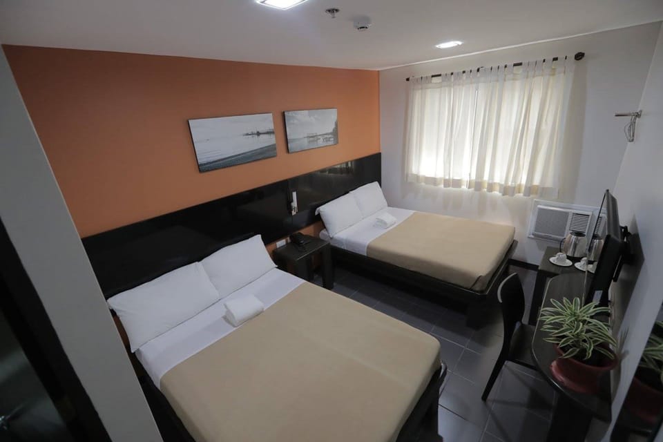 Family Room, Multiple Beds, Non Smoking | Desk, iron/ironing board, free WiFi, bed sheets