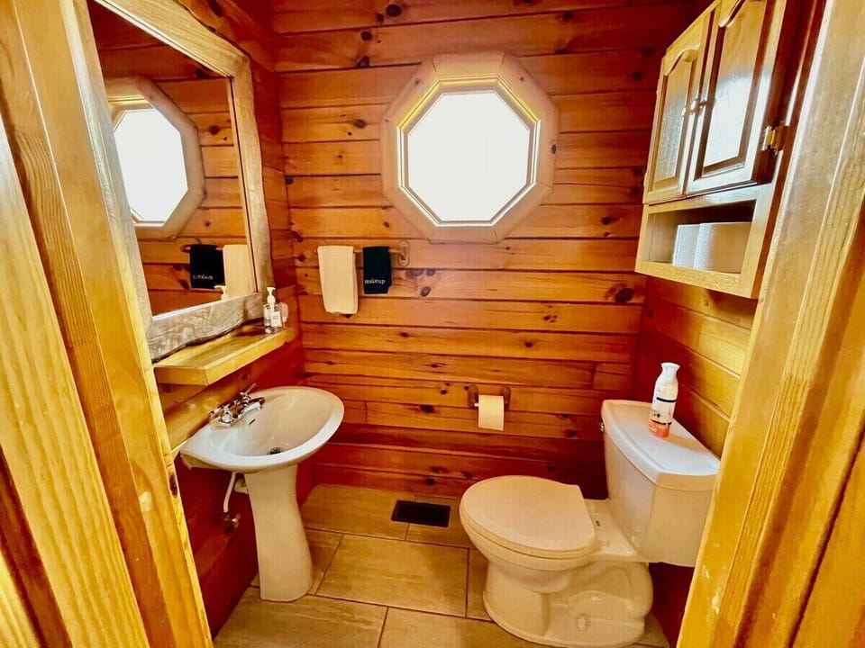 Half bath ensuite to the queen bedroom upstairs.