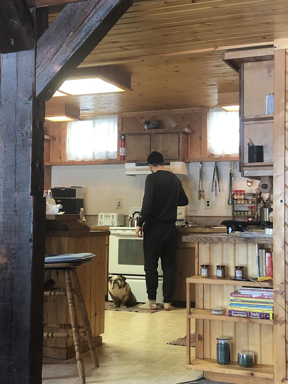 Man and his best friend cooking breakfast for the group!