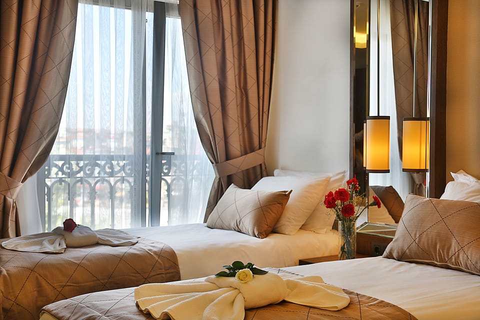 Triple Room | Premium bedding, minibar, in-room safe, individually decorated