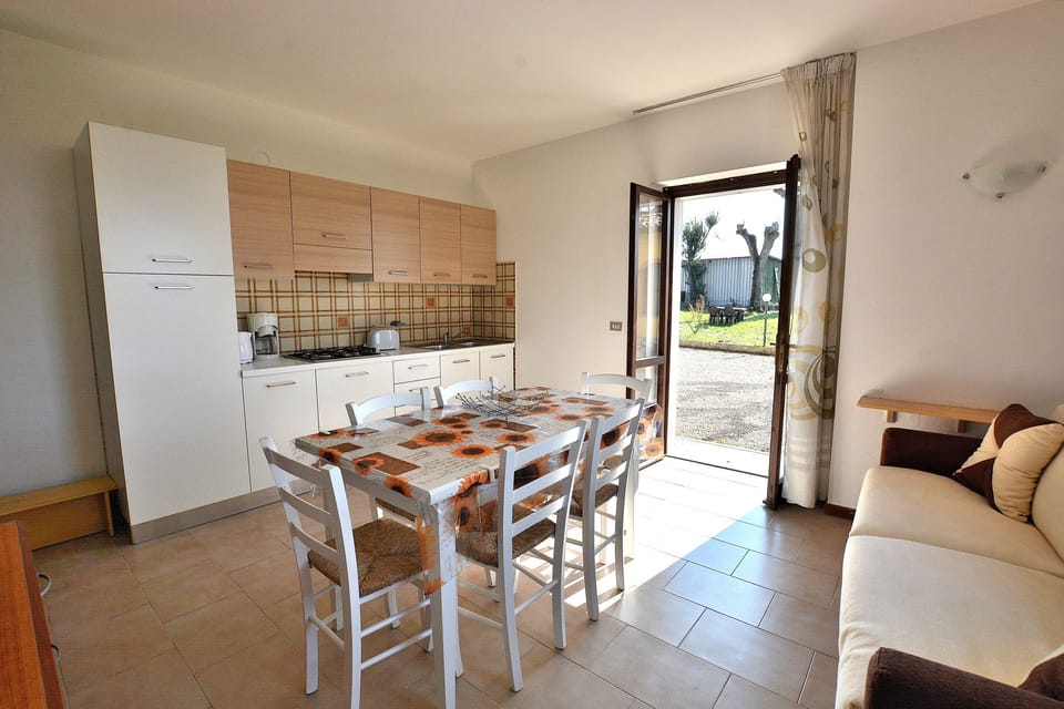 Apartment, 3 Bedrooms | Private kitchenette | Full-size fridge, oven, stovetop, espresso maker