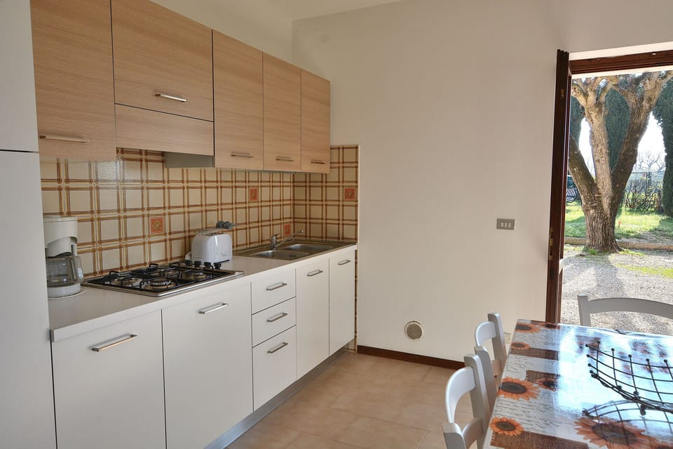 Apartment, 3 Bedrooms | Private kitchenette | Full-size fridge, oven, stovetop, espresso maker