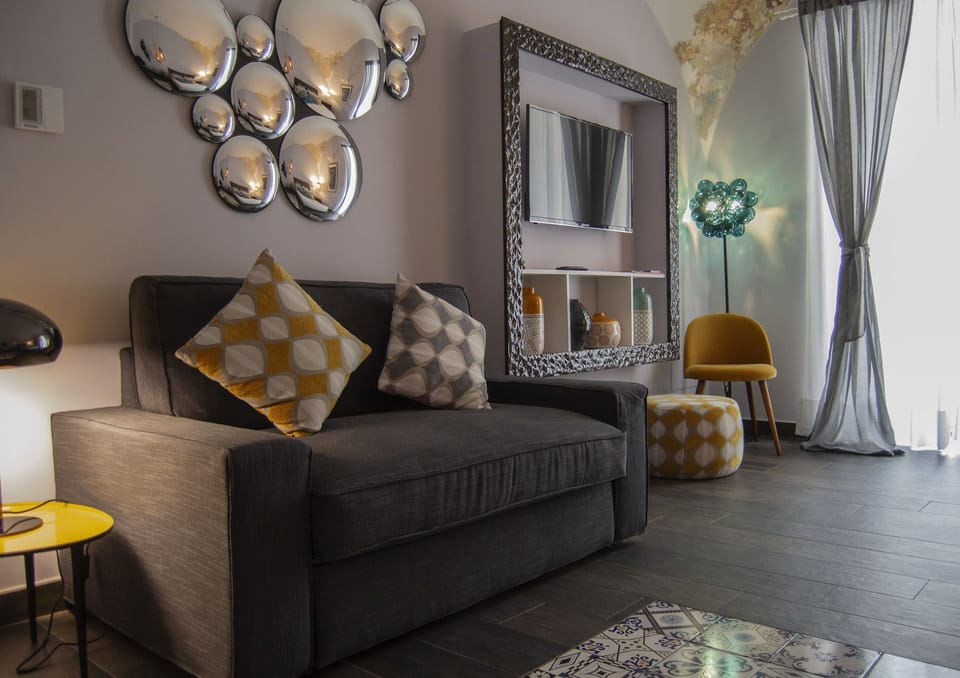 Deluxe Suite, Balcony (Valeria) | Living area | Flat-screen TV