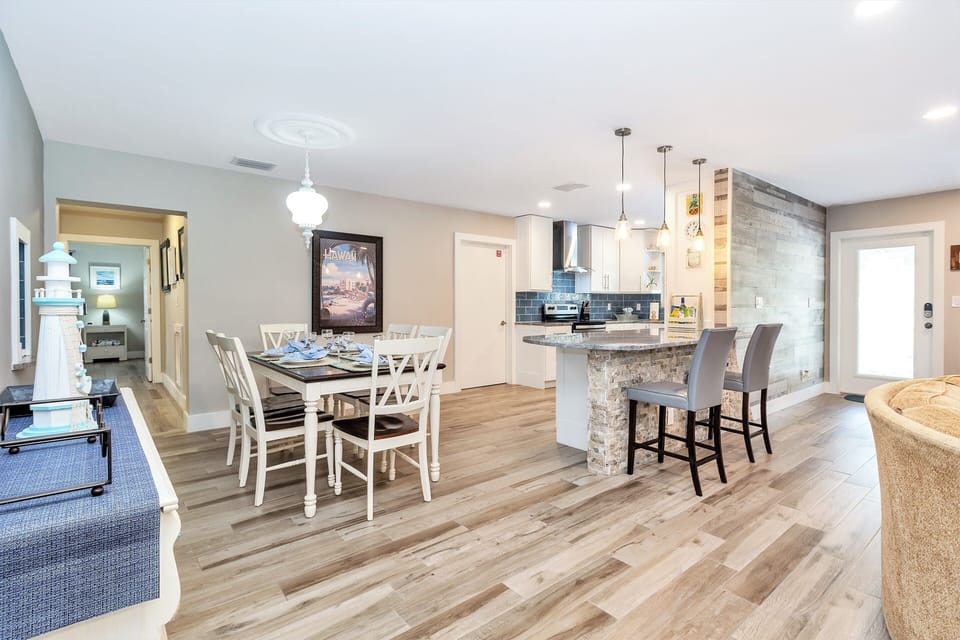 Dining Area, Kitchen and Bar with Place Settings for 12 and 