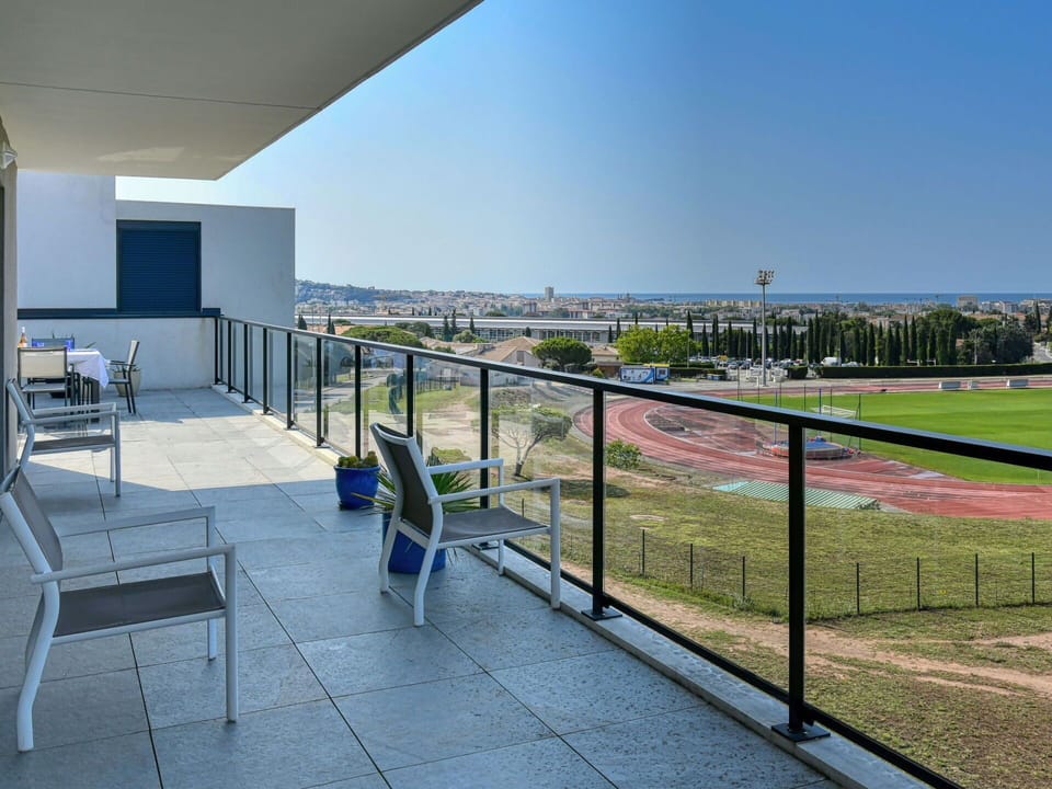 Sky, Building, Fence, Shade, Urban Design, Chair, Real Estate, City, Leisure, Condominium
