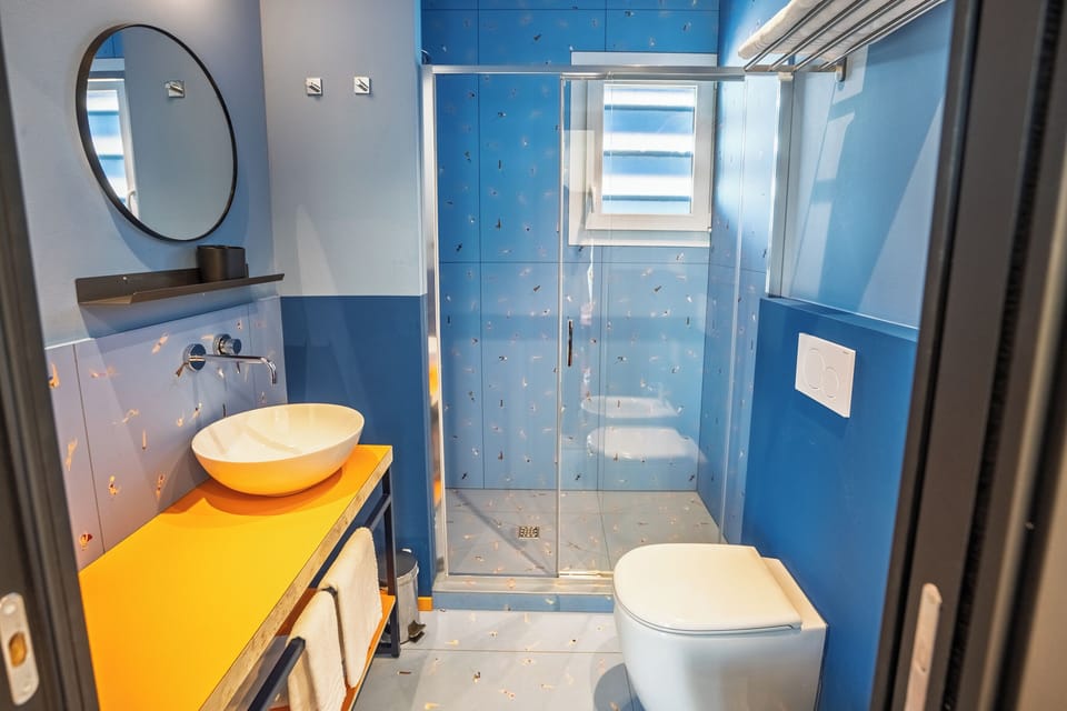Comfort Quadruple Room | Bathroom | Hair dryer, bidet, towels