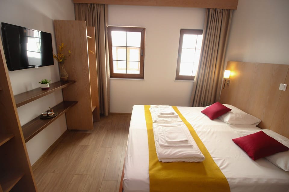 Standard Double Room, 1 King Bed, Non Smoking, City View | Minibar, individually decorated, individually furnished, desk