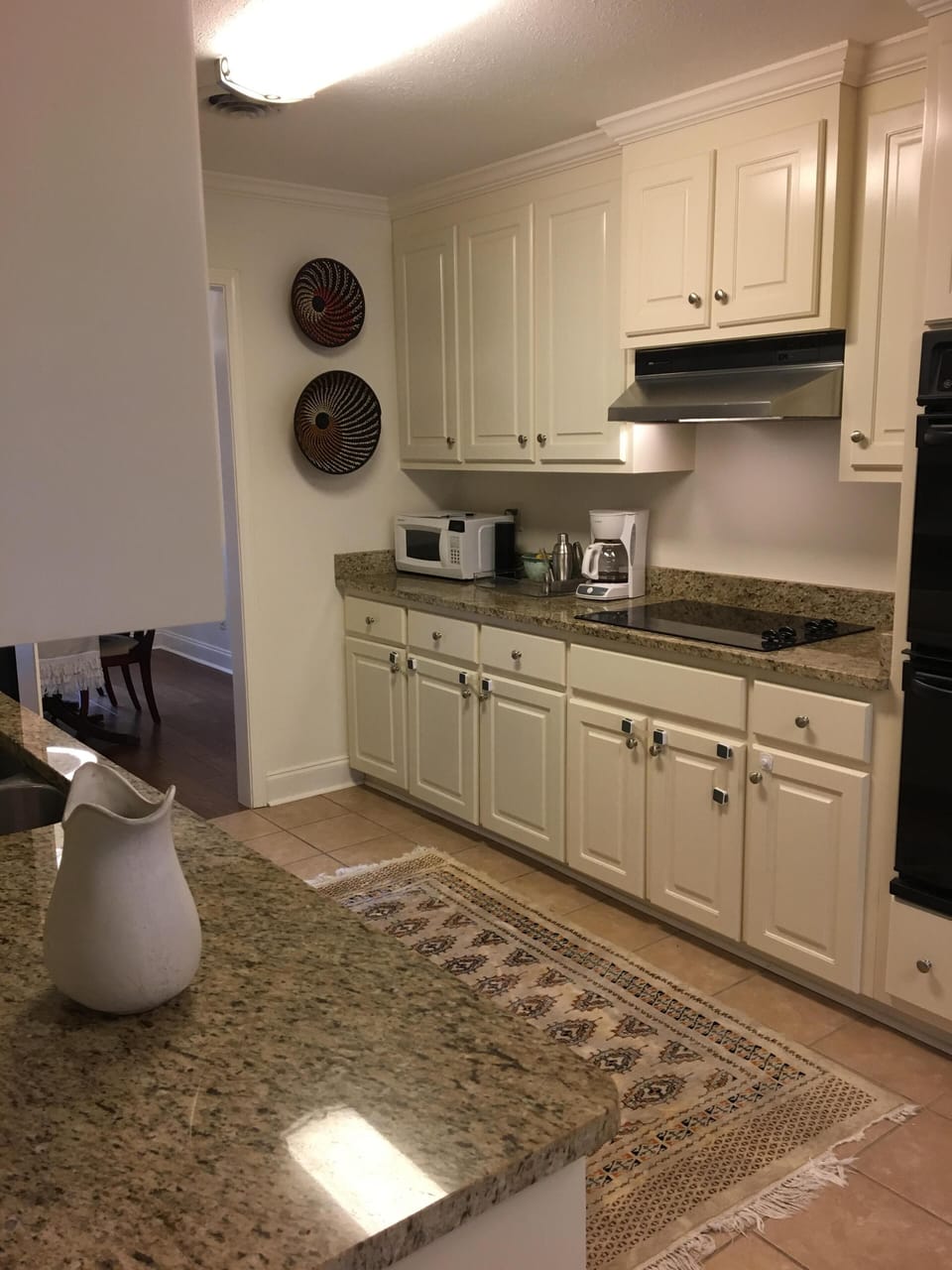 Kitchen: granite counters, two ovens, fridge/freezer, microwave, coffee maker