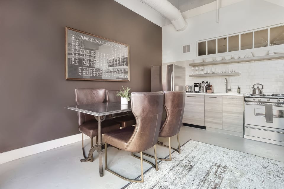Dining Area and Kitchen at Ponce City Market Apartment
