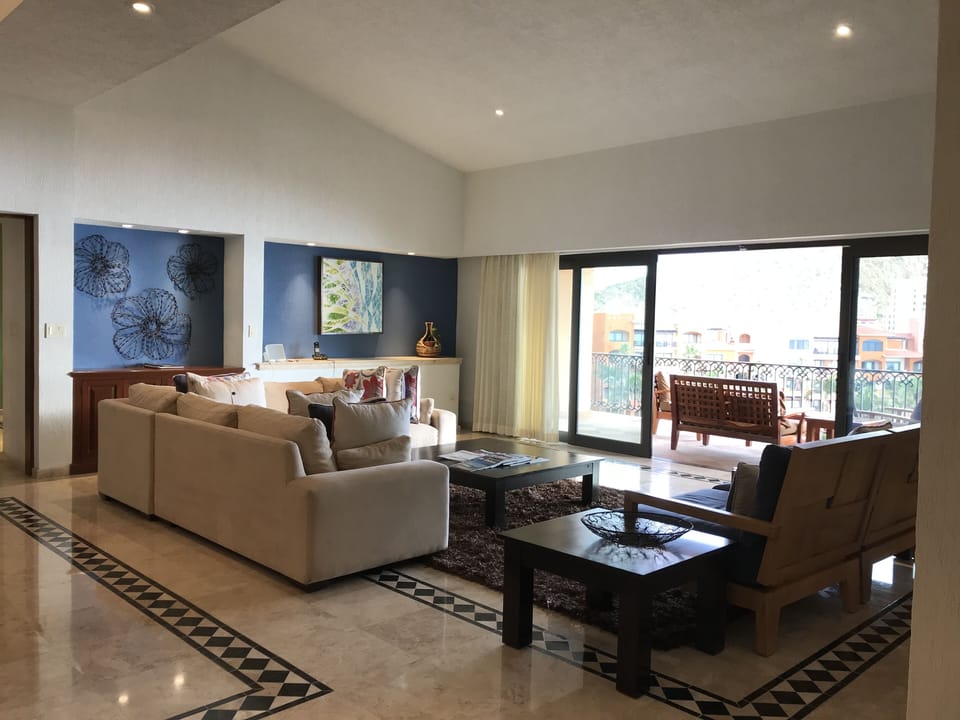 Vaulted Ceiling in living room with expansive views 