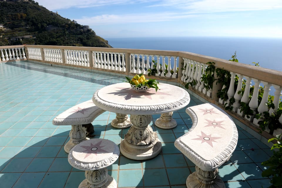 Main terrace with sweeping view of Coast and sea, below are the pool and gardens