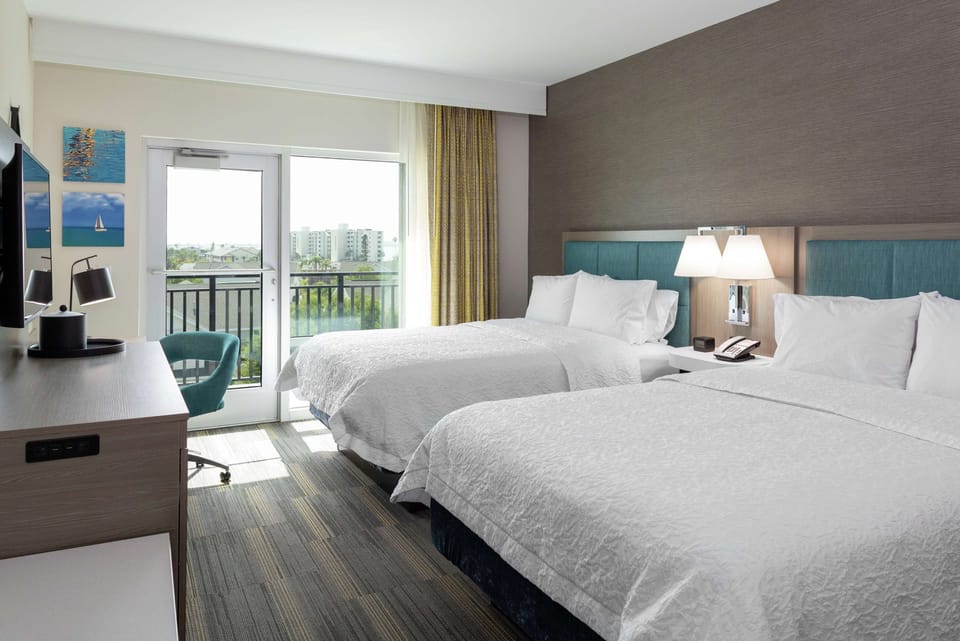 Room, 2 Queen Beds, Balcony | Premium bedding, desk, laptop workspace, iron/ironing board