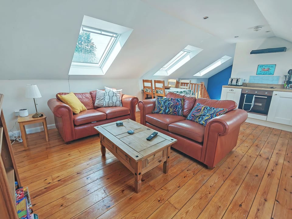 Open plan living space, Kitchen/dining, lounge. Vulux windows, log burner | Stonechat Barn - Little Derril, Derril, near Bude