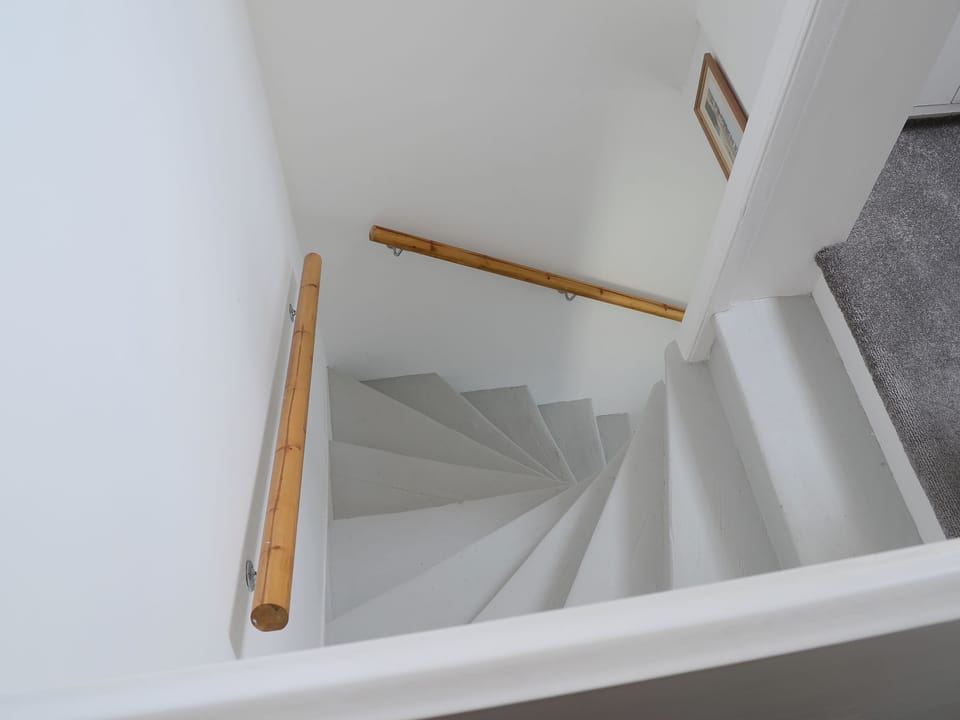 Turning staircase to the first floor | Sea Thistle Cottage, Nairn