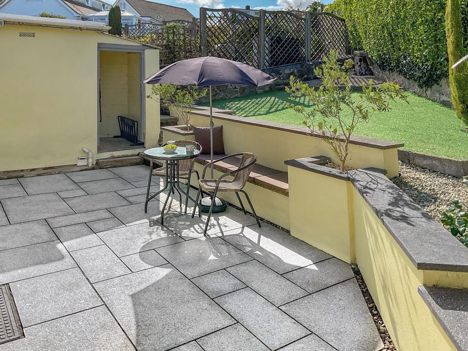 Well maintained rear garden.<br />Enclosed and private | Hafod y Bryn, Benllech, near Llangefni