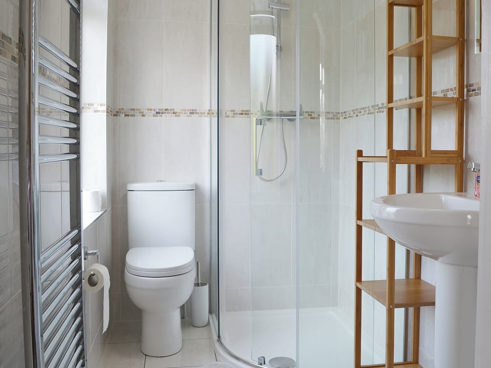 En-suite shower room with heated towel rail | Estuary View, Exmouth