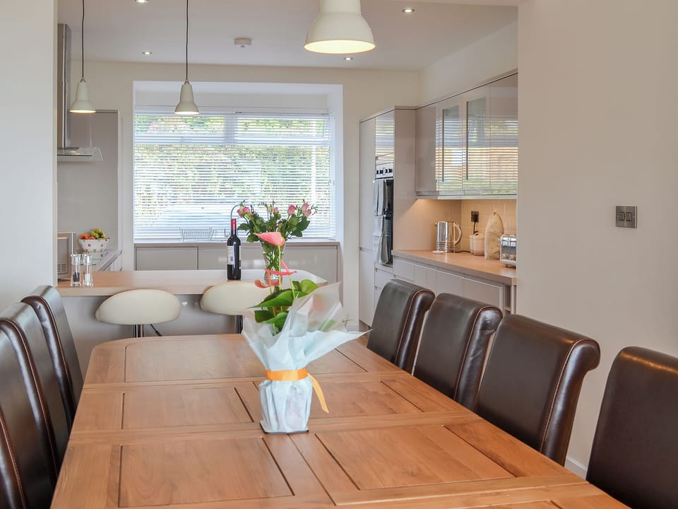 Large dining table ideal for entertaining | Estuary View, Exmouth