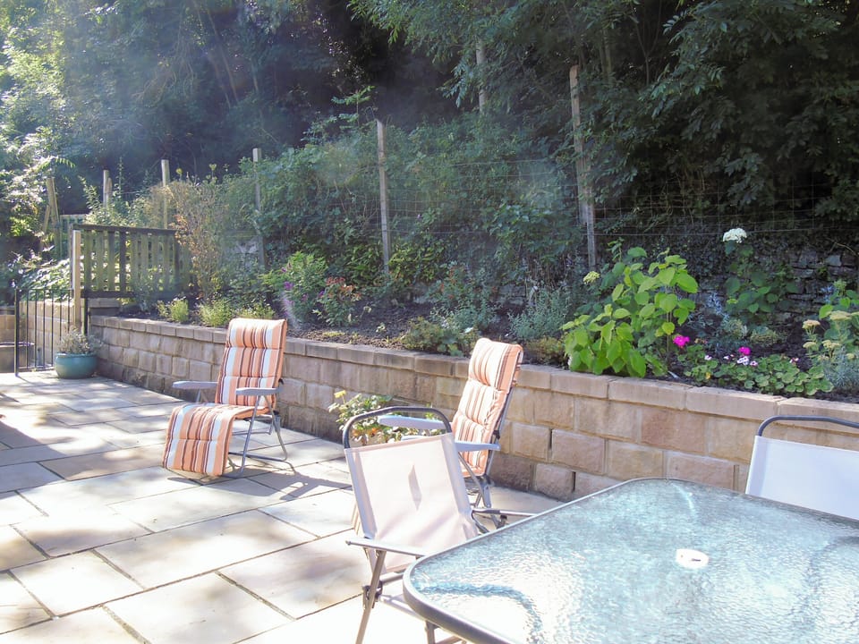 Enclosed patio with garden furniture and BBQ | Netherwood, Bakewell