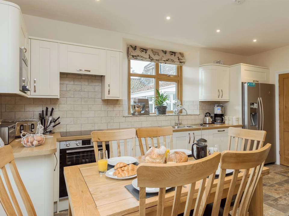 Well equipped kitchen/ dining room | The Farmhouse - Applebarn Holidays, West Pennard, near Glastonbury