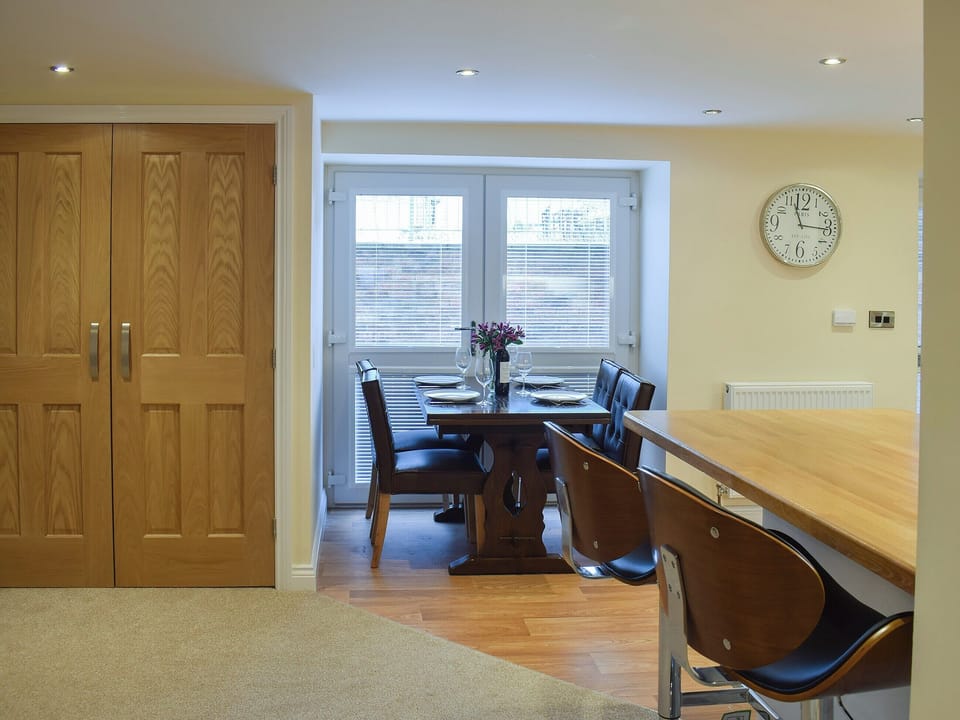 Modest dining area and adjacent kitchen | The Hideaway, Sleights, near Whitby