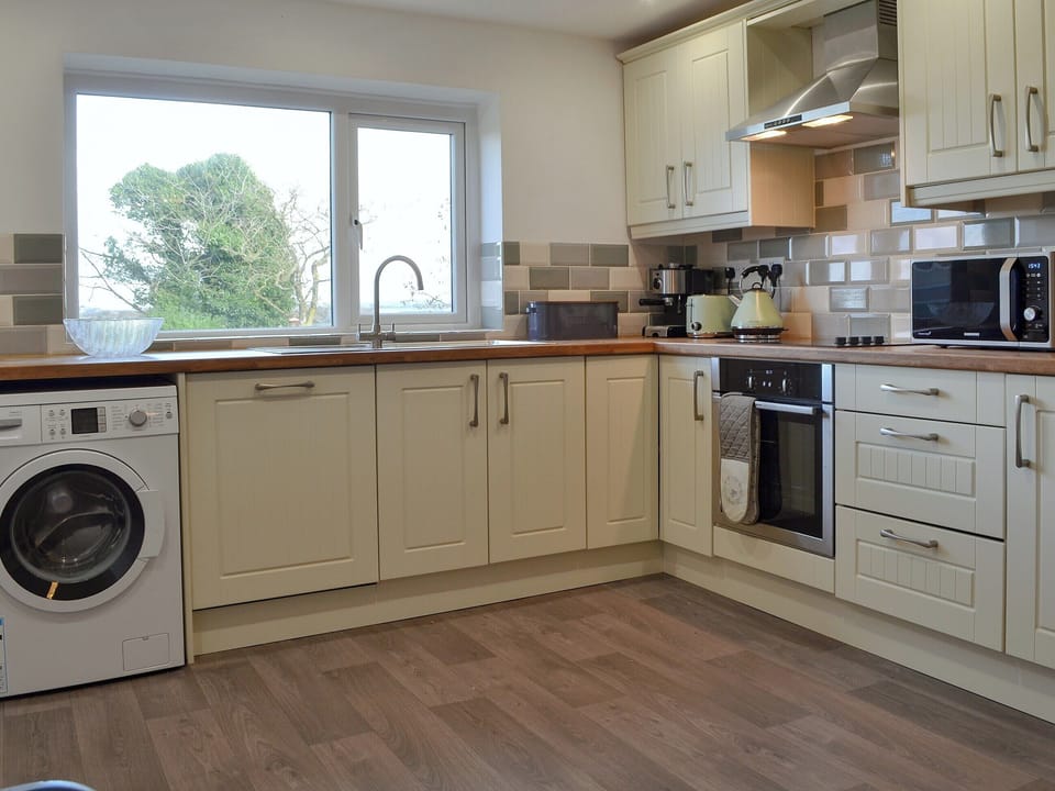 Well equipped kitchen/ dining room | Swallows Nest, Caergeiliog, near Holyhead