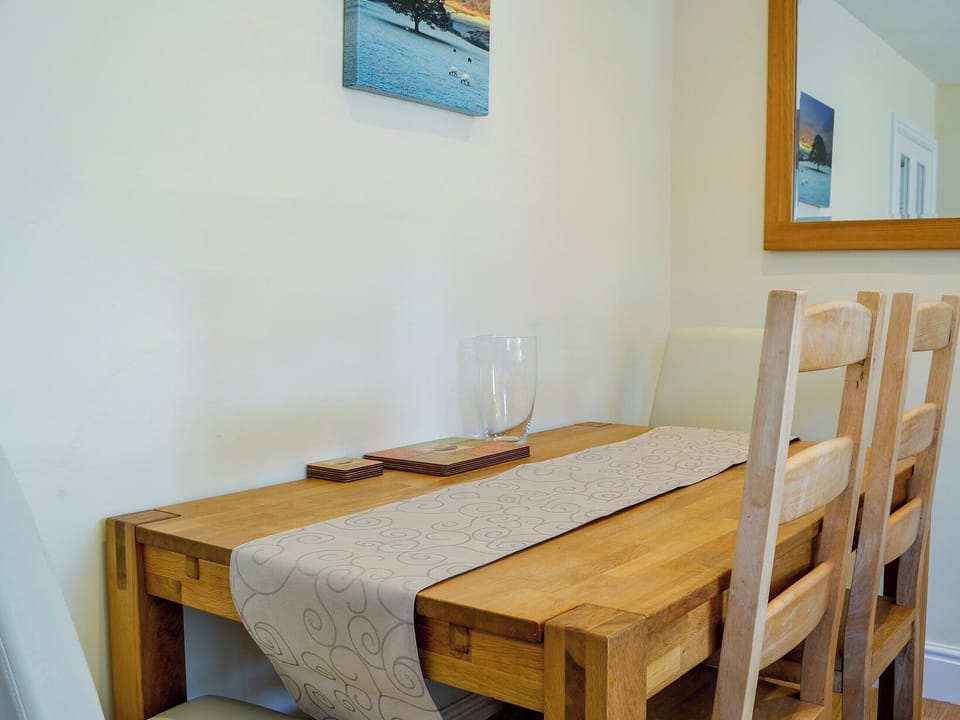 Modest dining area | Ghillie Cottage, Cockermouth