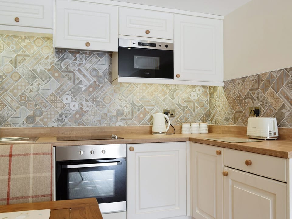 Fully appointed fitted kitchen | The Byres Tan - Stone House Farm Holiday Cottages, St Bees, near Whitehaven