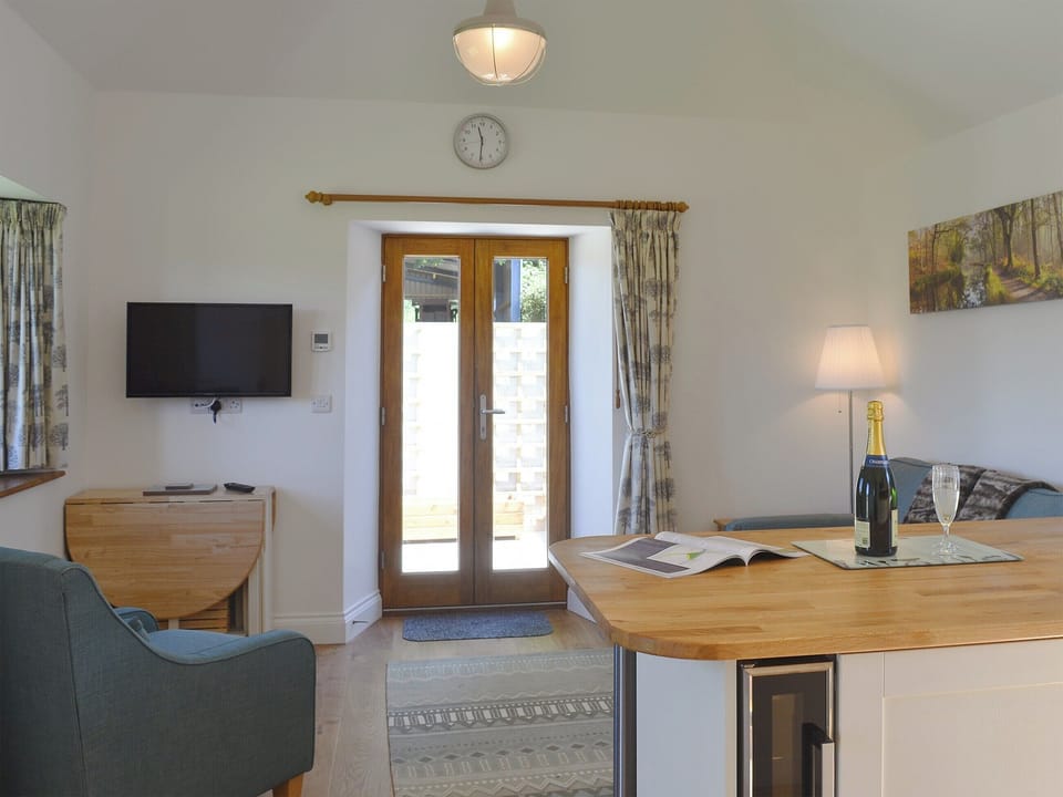 Comfortable open plan living space | The Cart Linhay, Meshaw, near South Molton
