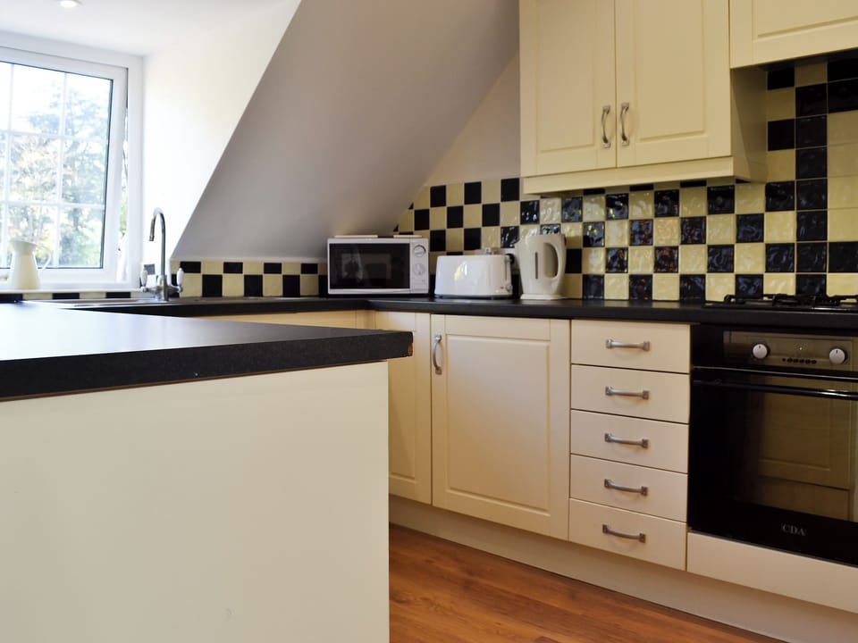 Lovely kitchen with breakfast bar | The Nest, York